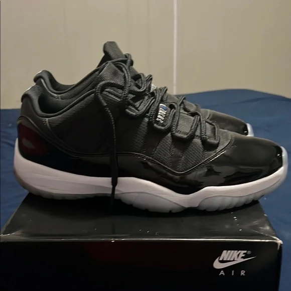 Jordan 11 Low Black White Sneakers - Picture 3 of 4